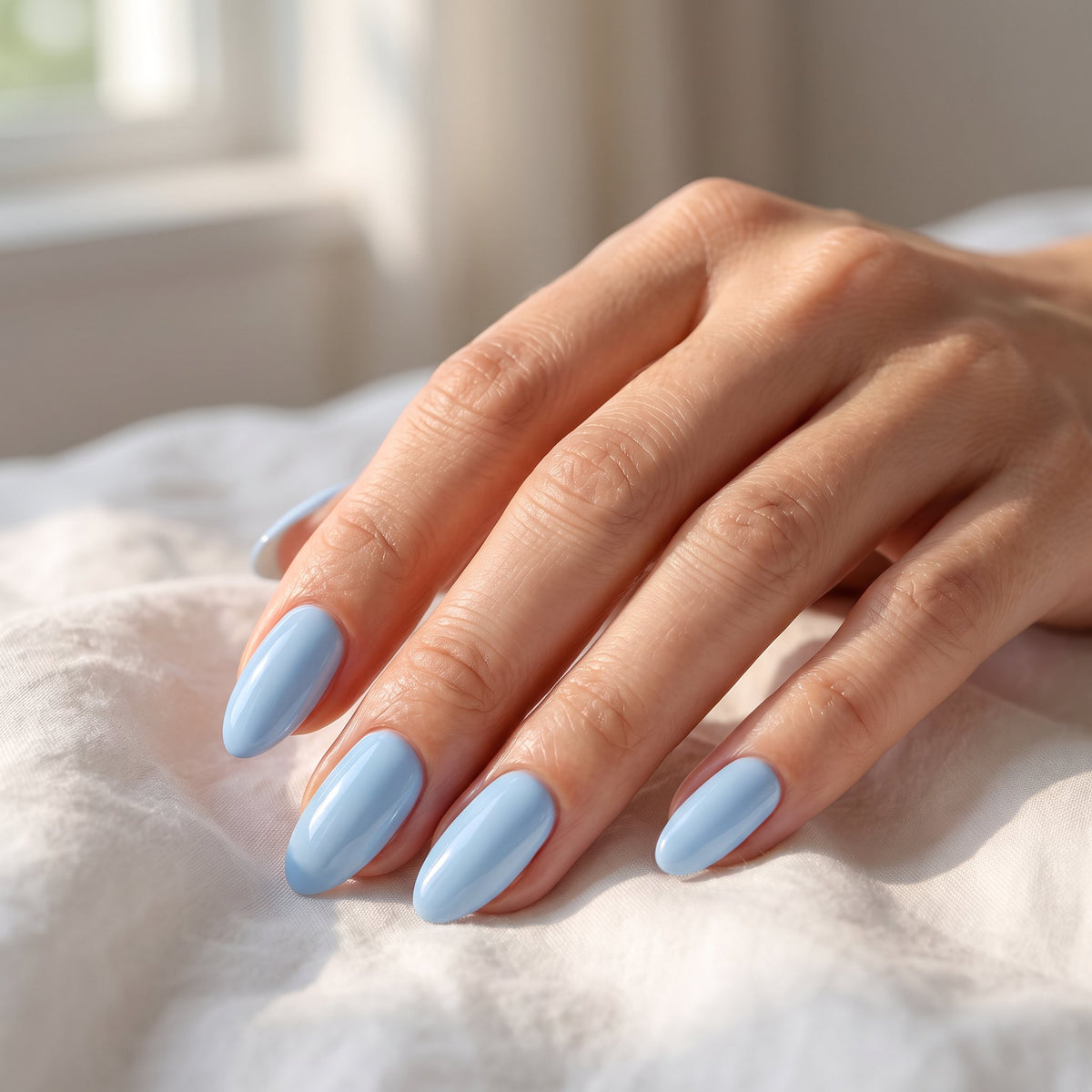 Naglar målade i #06 Baby Blue
